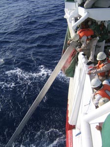 Figure 2. Test using under water setting device that prevents incidental catch of seabirds on the university's training vessel Shinyo-maru.